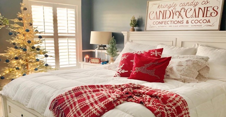 There’s nothing better for your overnight guests than finding a touch of holiday magic in their bedroom. Bedroom with Christmas decor.